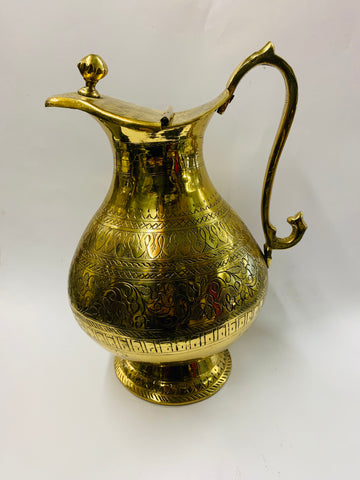 Large ornate brass jug