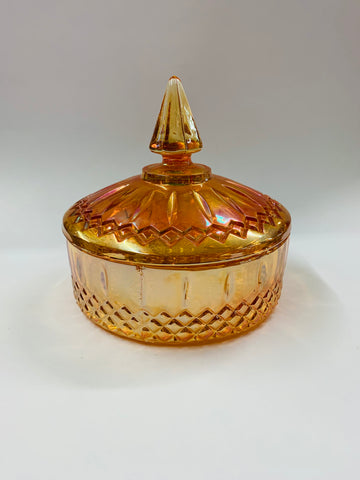 Orange carnival glass lidded bowl