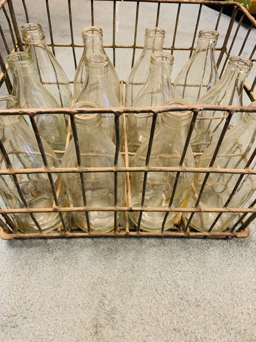 Vintage milk crate with 12 quart milk bottles Antique Alley