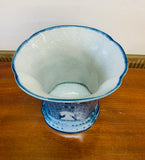 Blue and white ceramic castle scene vase