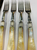 Set of 8 mother of Pearl handled dessert knives and forks