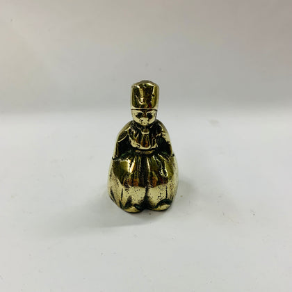 Small brass bell in the shape of a lady