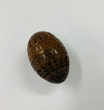 Carved coquilla nut egg shape case