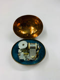 Brass musical egg with semi precious stones