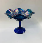Rare purple/blue carnival glass compote with Peacock design