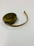 Vintage brass tape measure