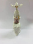 Lladro Nun doing needle work
