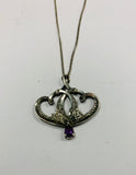 Art Nouveau sterling silver pendant on silver necklace