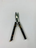 Faux turtle Shell folding scissors