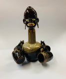 Novelty African head decanter and glasses