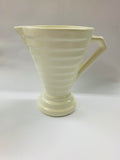 White hand potted beehive style jug