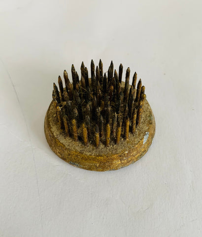 Small metal flower frog