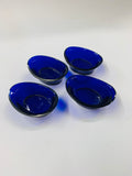 Set of 4 Sterling Silver salt pits with blue glass liners