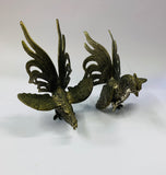 Pair of vintage metal fighting roosters