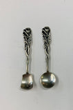 Pair of Sterling silver rose handled salt spoons