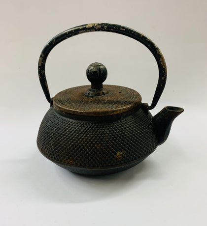 Cast iron antique tea pot