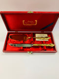 Marjonette gold plated cake knife and slice