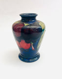 Moorcroft Small Blue Vase with Yellow and Red Fruit and Tapered Bottom