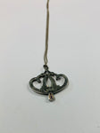 Art Nouveau sterling silver pendant on silver necklace