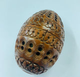 Carved coquilla nut egg shape case