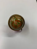 Antique tape measure with geometric floral design