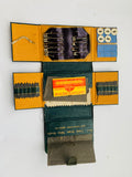 Vintage folding green leather needle case