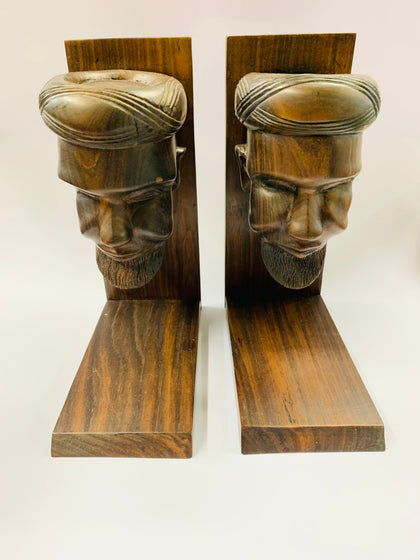 Pair of hard wood men’s head bookends