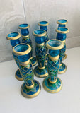 8 vintage blue glass and gold painted candlesticks
