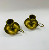 Pair of brass wee willy winky candle holders