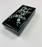 Black lacquer and mother of pearl jewellery box