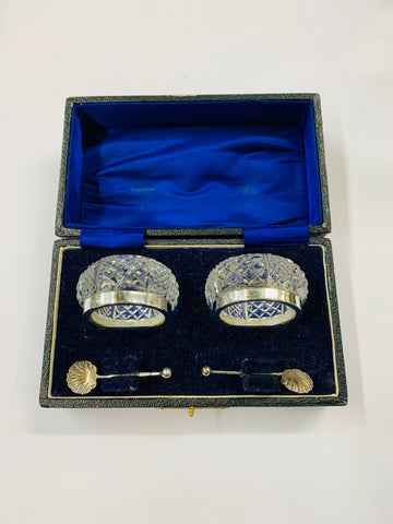 Sterling silver salt pots and silver shell salt spoons