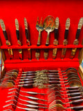 44 piece brass and teak wooden handled cutlery set
