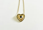 Gold Tone Necklace with Sterling Silver Heart pendant with a blue Stone