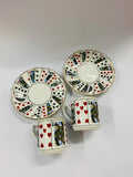 Pair of Elizabethan playing card cups and saucers