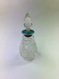 Sterling silver and enamel topped perfume bottle