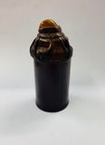 Antique leather covered dice shaker with stone jewel top