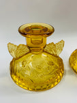 Pair of Amber Glass butterfly candlesticks