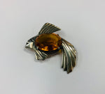 Large sterling silver fish brooch with orange stone