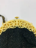 Antique beaded hand bag with Bakelite top