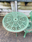 Heavy Antique cast iron patio table and chair