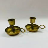 Pair of brass wee willy winky candle holders