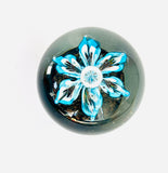 Clear Paperweight with a Unique Blue Flower with Water Droplet