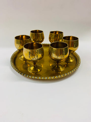 Brass tray with 6 small brass liqueur glasses