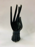 Black wooden hand