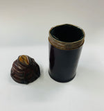 Antique leather covered dice shaker with stone jewel top