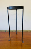 Large cobalt blue glass bell vase in a metal holder