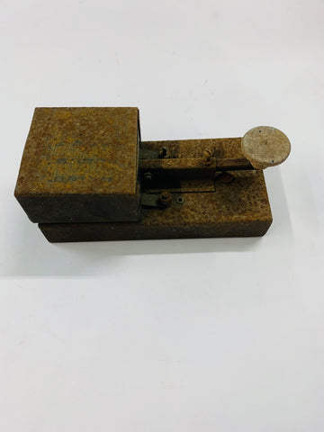 Antique metal Morse code machine