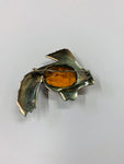Large sterling silver fish brooch with orange stone