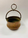 Antique beaten copper cauldron