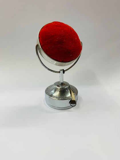 Chrome plated pin cushion and tape measure